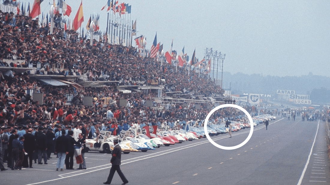 Jacky Ickx walking across the track at the start of the 1969 24 Hours of Le Mans